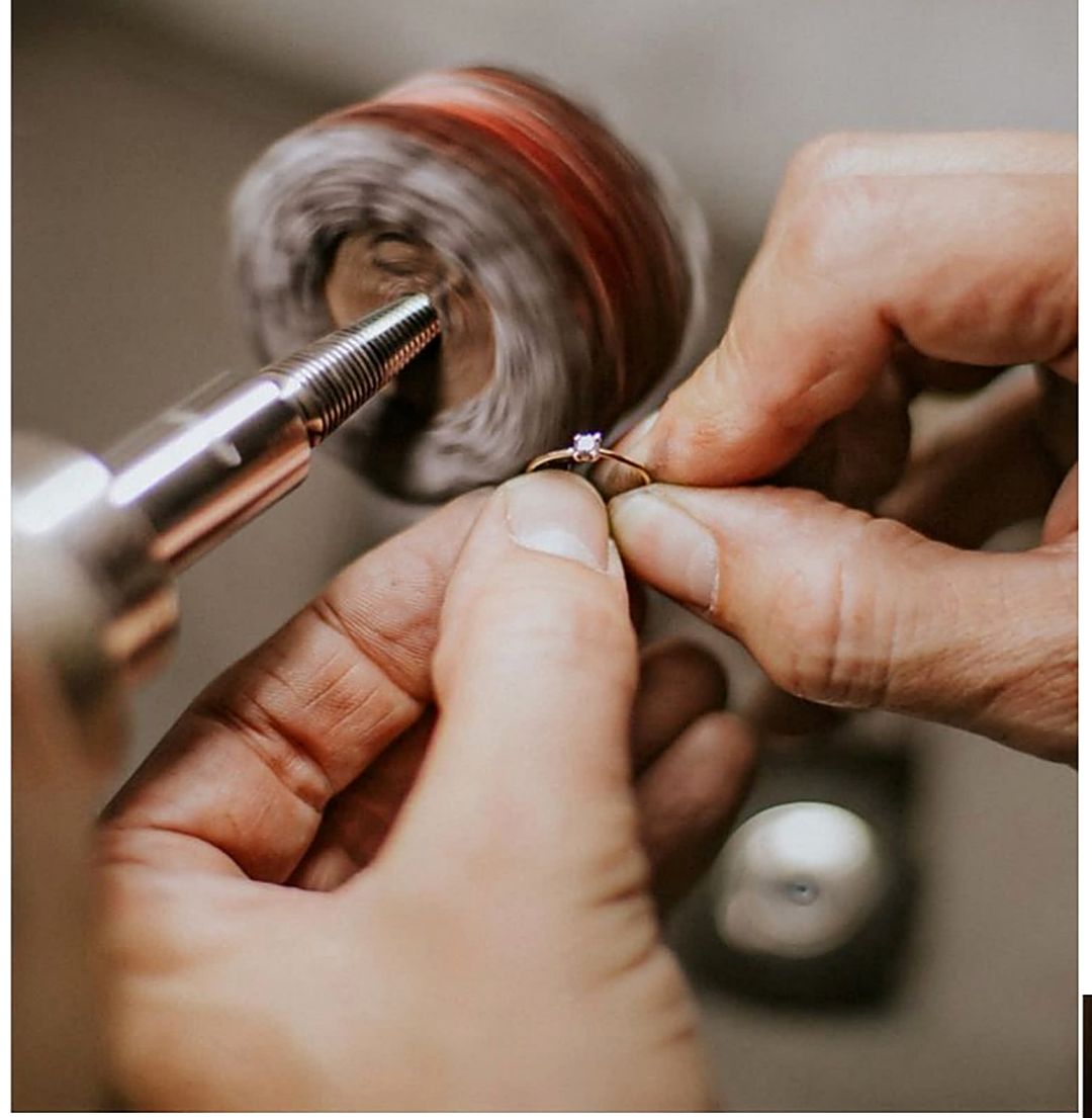 Close-up of diamond selection with precision tweezers at VT Gems