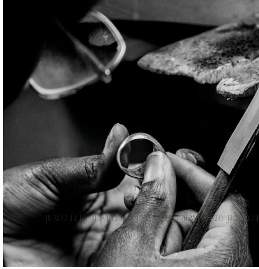 A VT Gems craftsperson finishing a ring at the bench